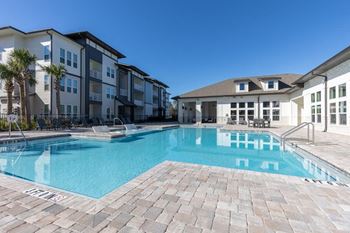 Sparkling pool with sun deck
